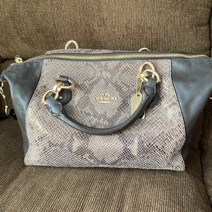 Brown snakeskin coach